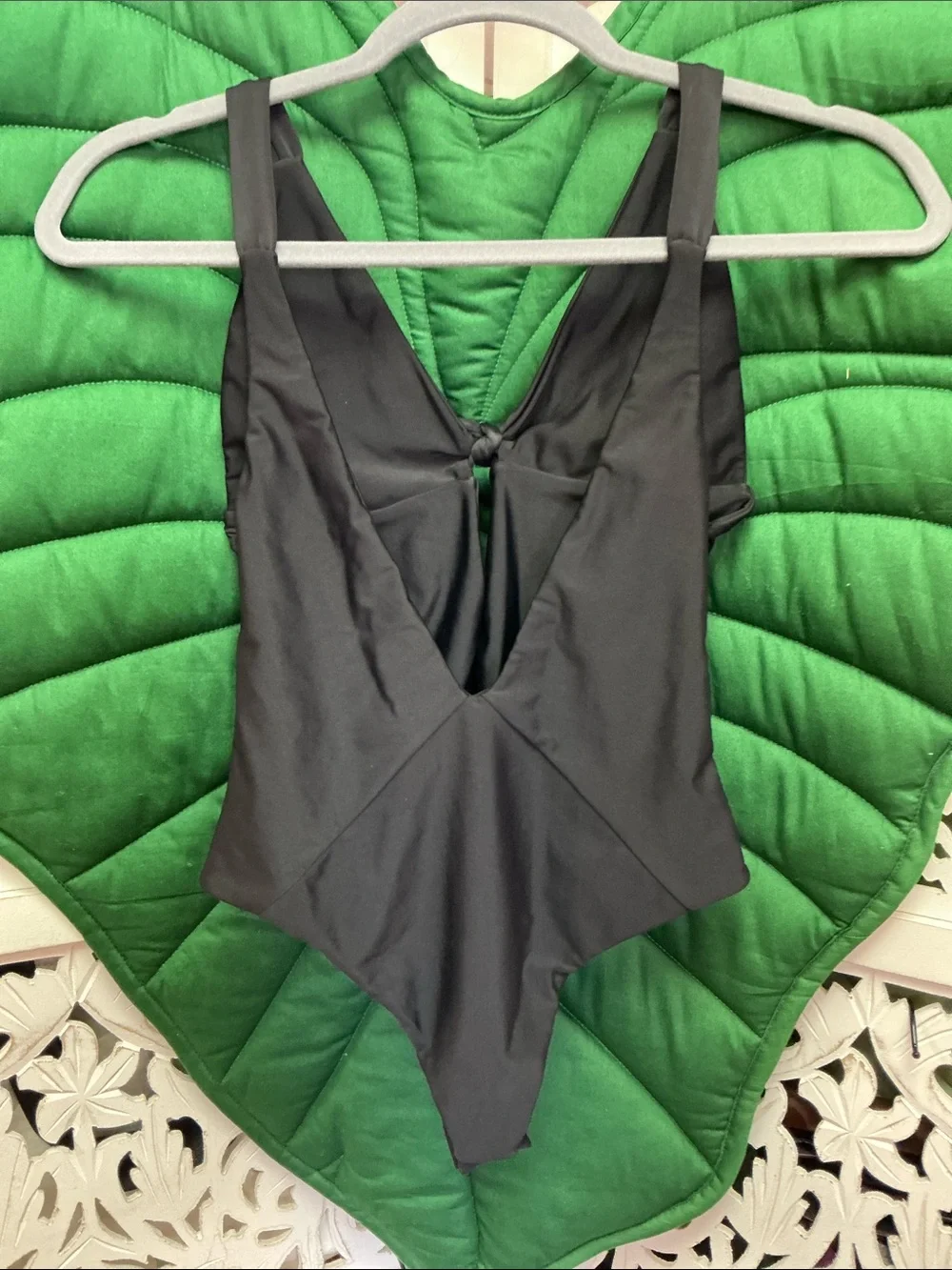 Benoa black one piece swimsuit front bow tie, low V back, size L